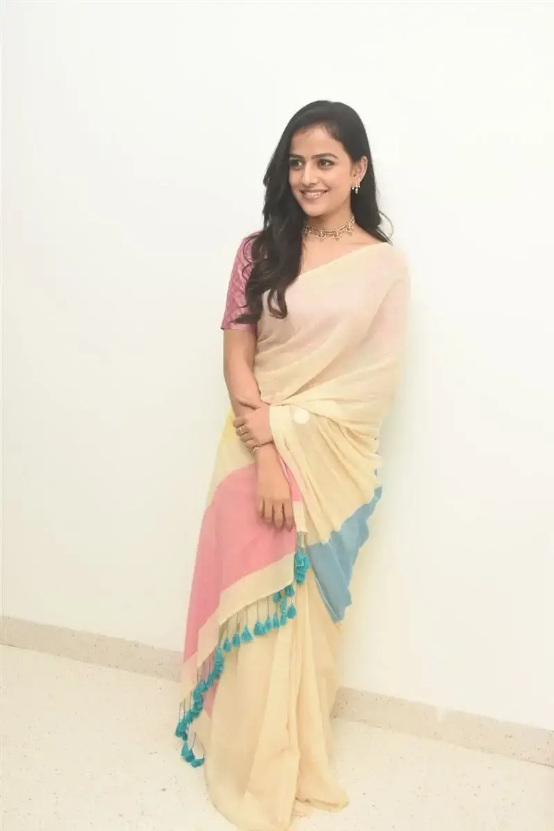 Vaishnavi Chaitanya in Yellow Saree at Hair Clinic Launch